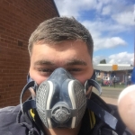 Our Bathroom Fitter with Safety Mask.jpg